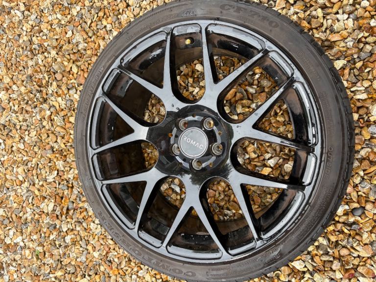 Gloss black Romac Diablos alloys and tyres 