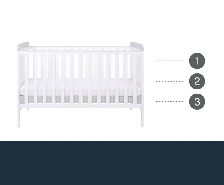 Cot bed with top changer