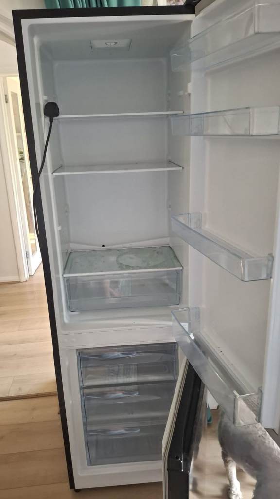 Must go quickly. Black Freestanding Fridge Freezer 