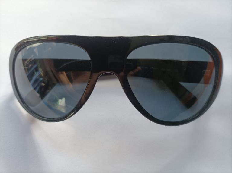 Prada black sunglasses with case and cloth