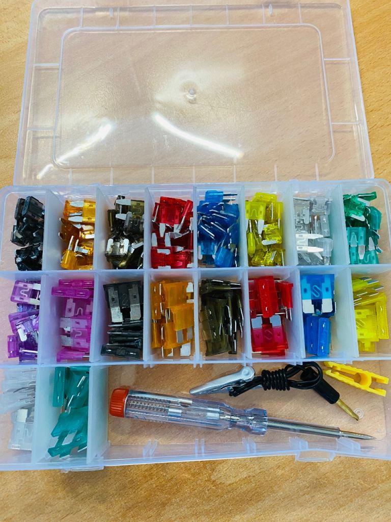 Car fuses set with remover clip and tester.