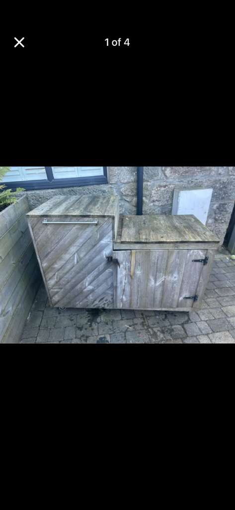 Outdoor wooden kitchen area wheeled pizza storage