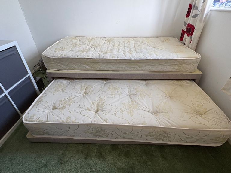 Single guest bed that turns into a large double bed 