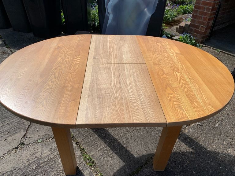 Solid oak extendable round table