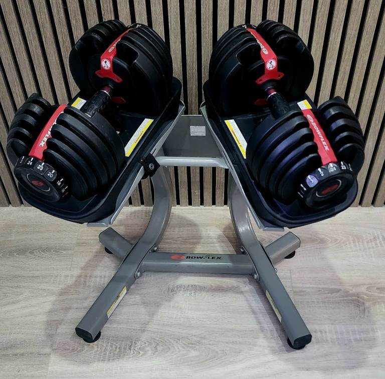 As new Bowflex SelectTech 552i 2-24kg adjustable dumbbells with stand
