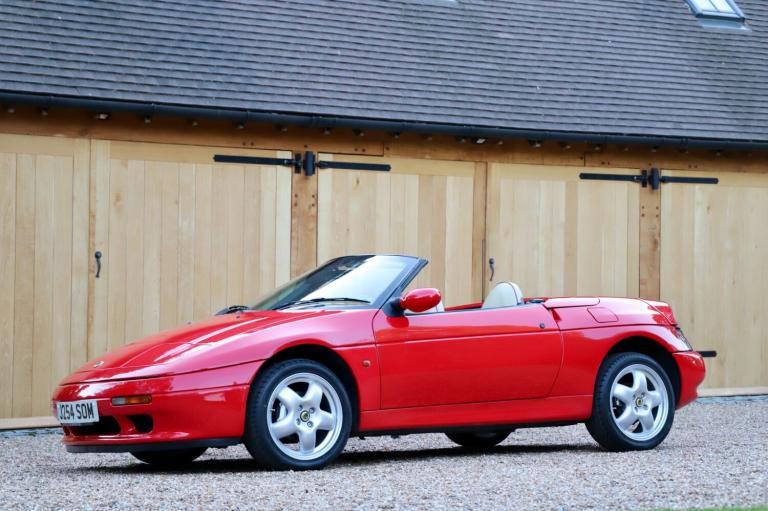 1991 Lotus Elan SE Turbo, 1991. Calypso Red with magnolia leather seats piped in red. CONVERTIBLE...