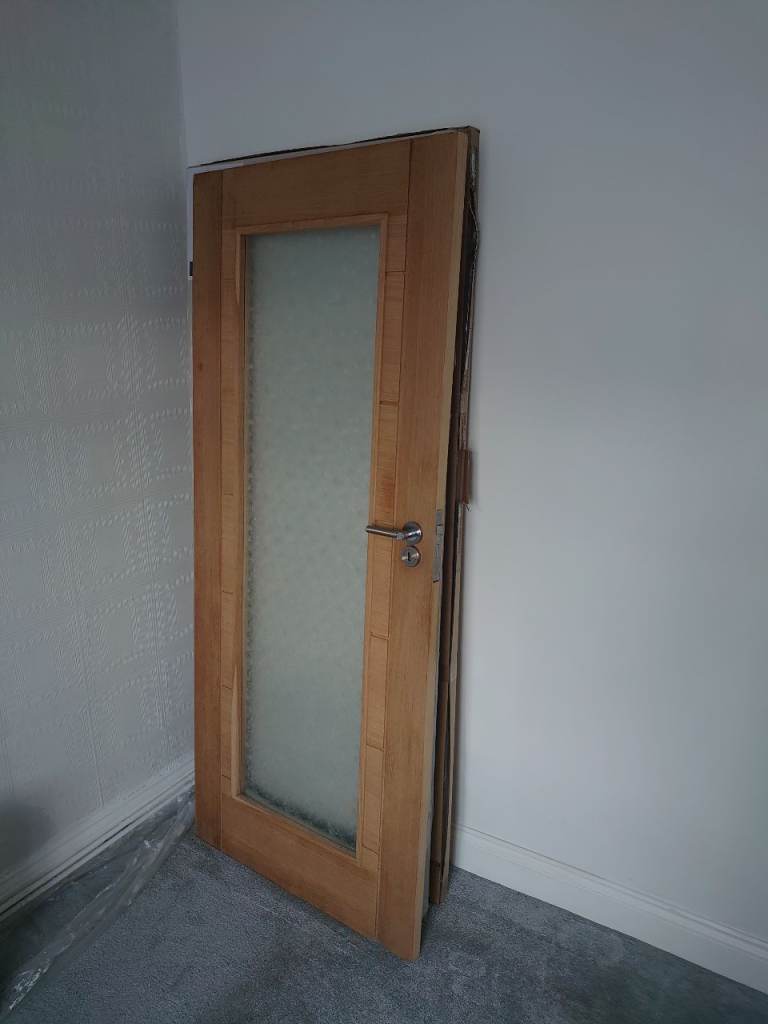 £30 ONO. Oak natural internal Glazed door. Has a handle + door lock