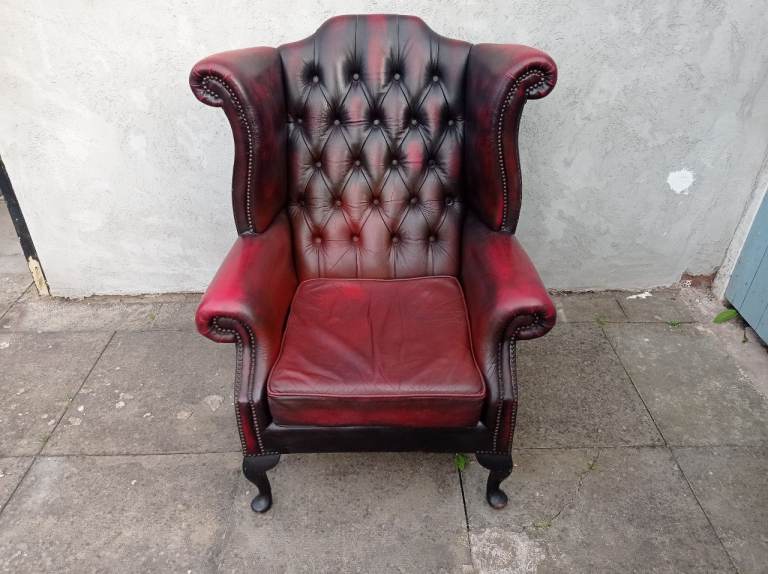 A Red Leather Chesterfield Queen Ann Wing/ Armchair