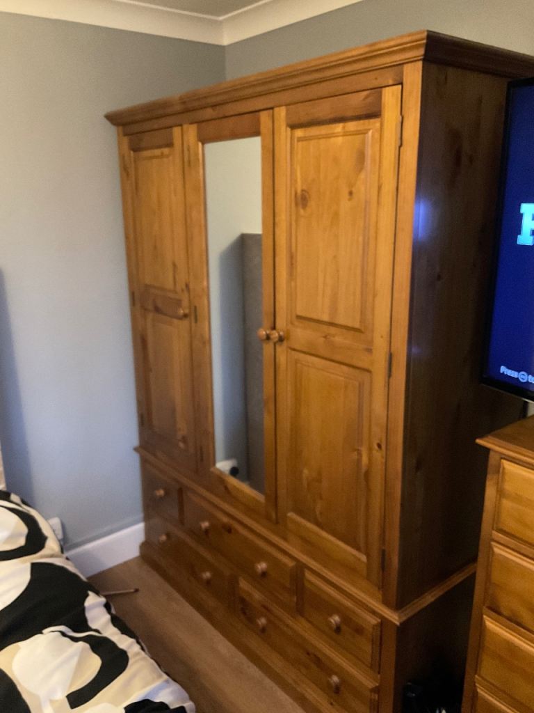 Solid pine 3 door wardrobe and 6 draw chest 