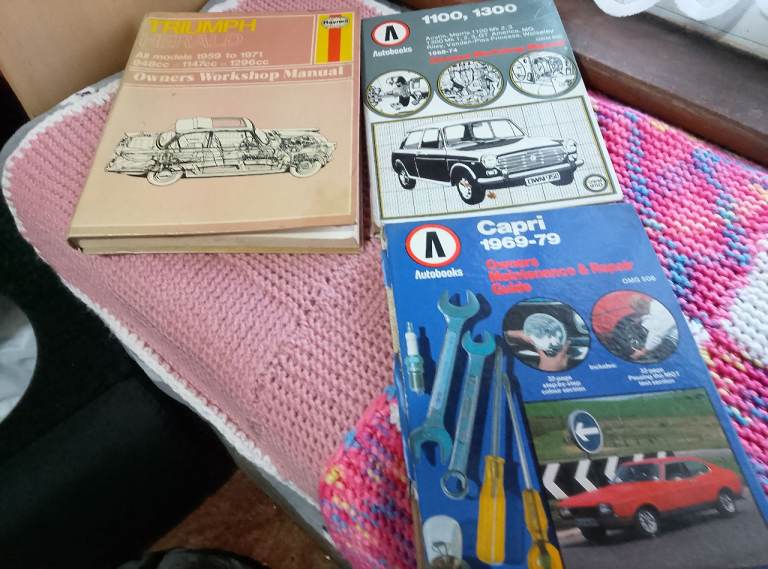 Three old car manuals One Haynes and Two Autobooks