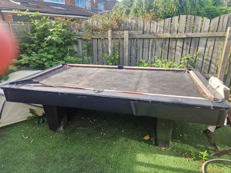 Free pool table.  Slate base so very heavy but can be restored to a great table with some TLC