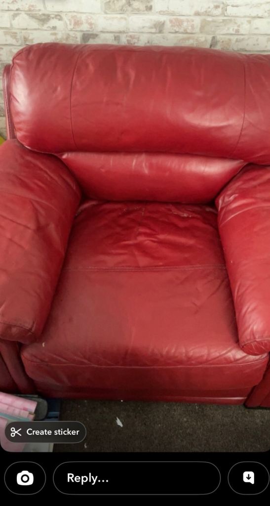 Red faux leather armchair