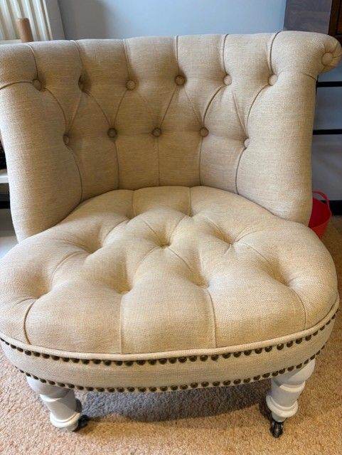 cream coloured bedroom studded chait