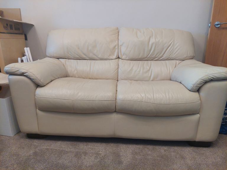 Reduced price Two seater sofa in cream sofa leather
