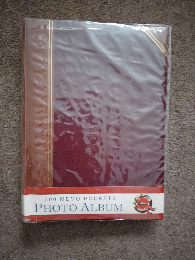 PHOTO ALBUM for 300, 4 X 6ins photos. Quality, bookbound, new in outer cover.