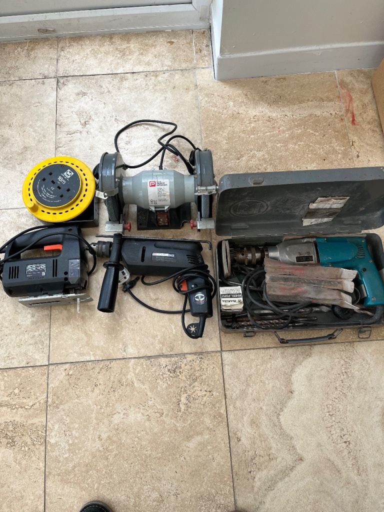 Makita Hammer Drill with Case and Accessories – Good Condition