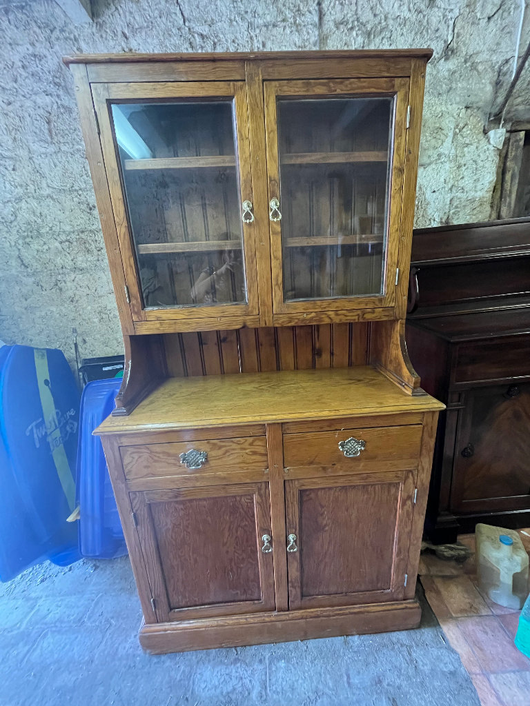 A pine kitchen dresser with glazed top