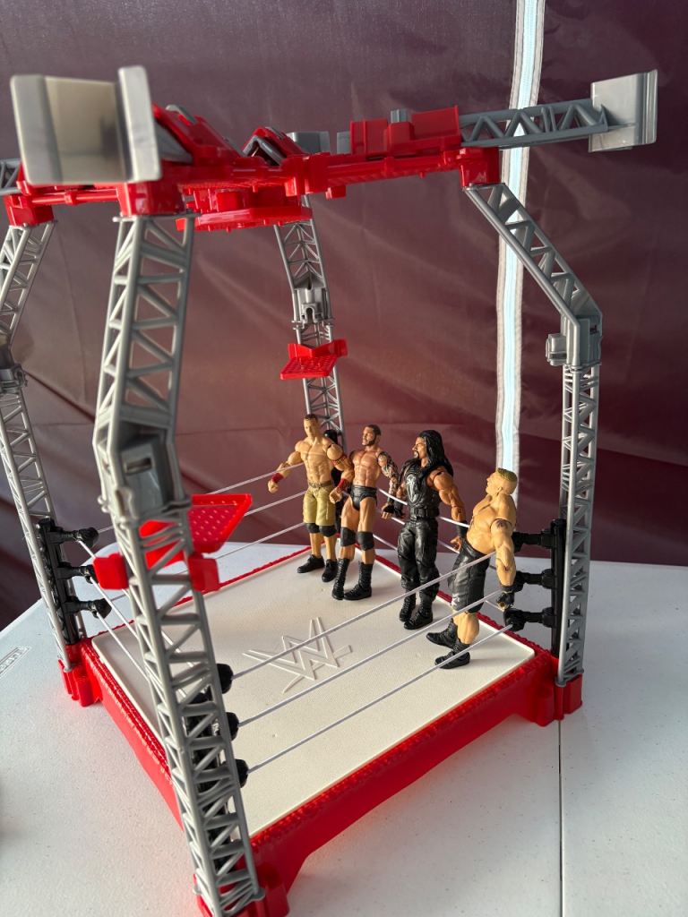 WWE Wrestling Ring with 4 Action Figures