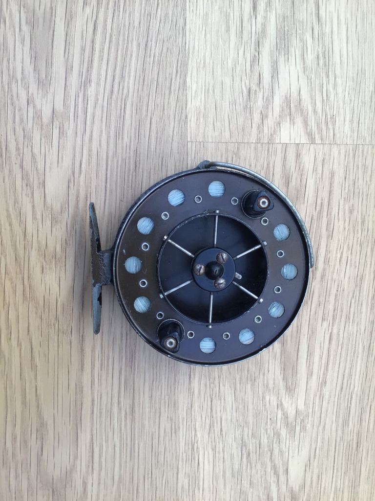 Mordex Merlin Fishing Reel  A few Chips on Paint work But in good working order 