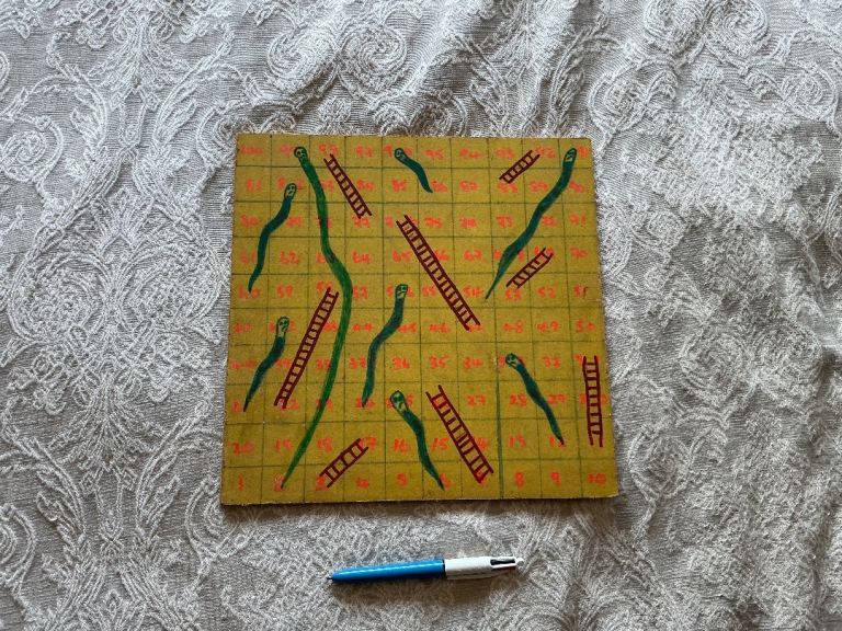 Home made snakes and ladders board
