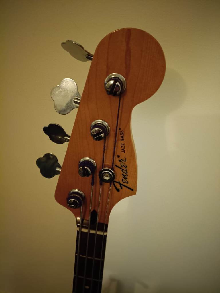 Fender Jazz bass in Lake Placid blue with Fender hard case, pickup upgrade