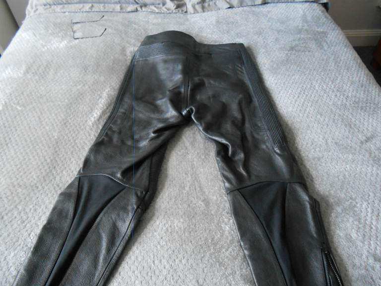 BRAND NEW LEATHER MOTORCYCLE TROUSERS.