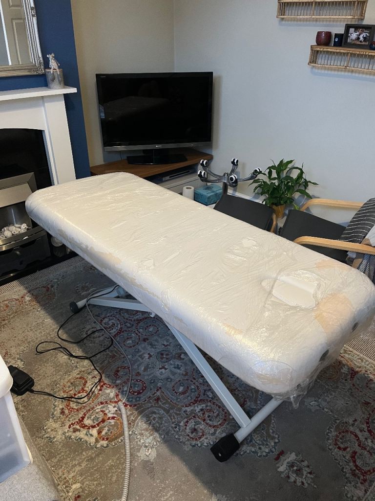 Adjustable Massage/Treatment Bed