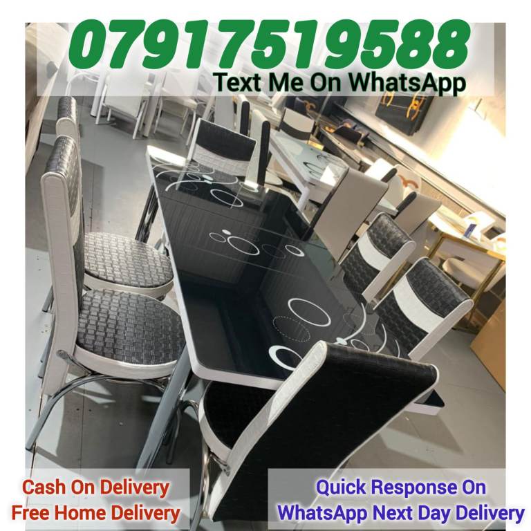 Black Glass Dining Table with Six Metal Chairs – Nearly New Condition