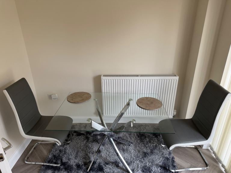 Glass Dining Table with Grey Chairs – Good Condition