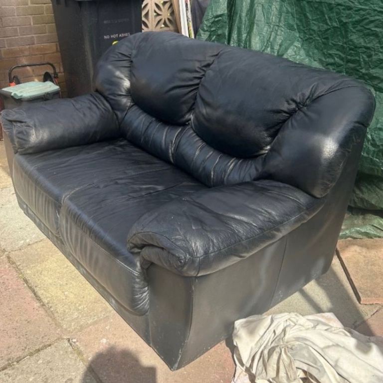 FREE Black Leather Two-Seater Sofa - Good Condition