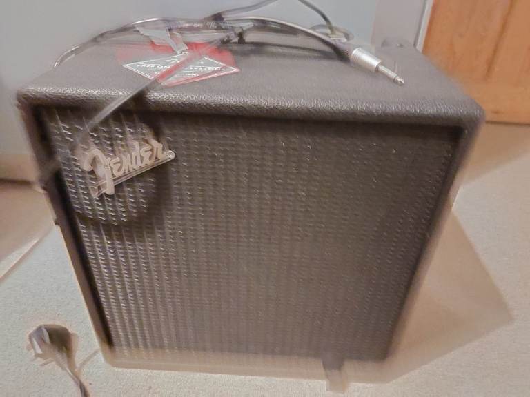 Bass guitar and bass amp combo