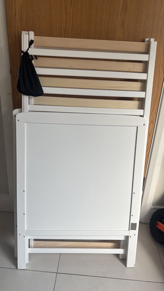 Cot and mattress barely used a few paint scratch from biting pet smoke free home