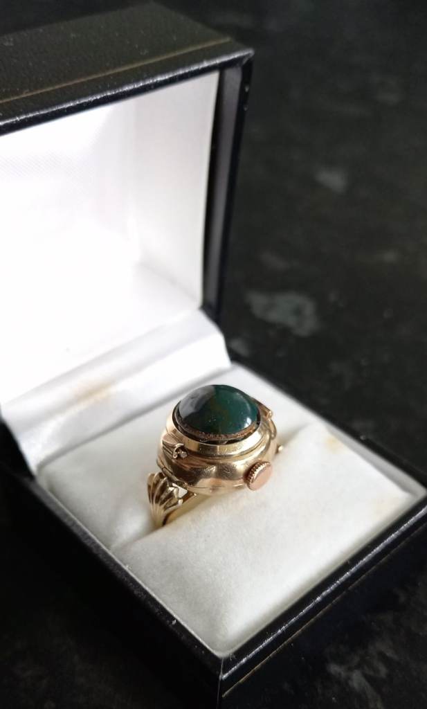 Gold ring watch