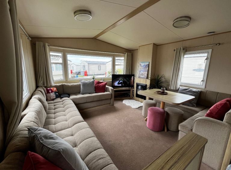 Open to offers Beautiful ABI static caravan sited on the white towers holiday park in Caernarfon