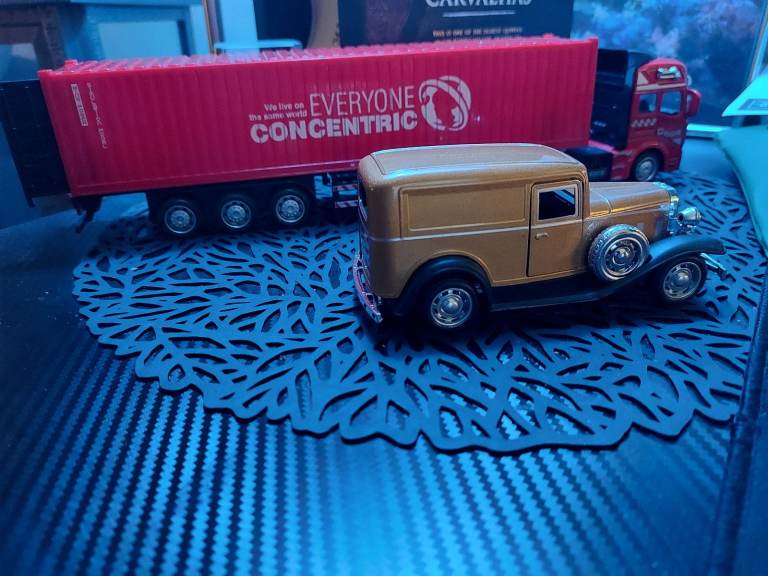 quality detailed 1/48scale 12.6 inch long 10 wheeled articulated trucks in 4 colours  new in box