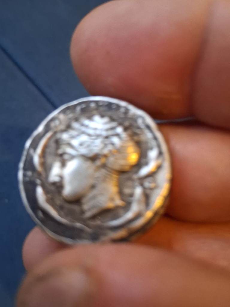 Ancient-Style Silver Coin with Head Relief