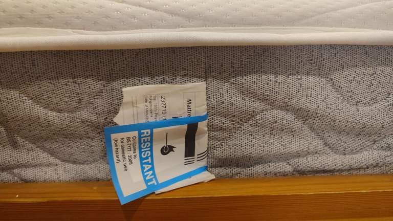 Pine single bed with 6 month old mattress.