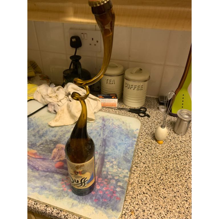 Twisted bottle of duff beer