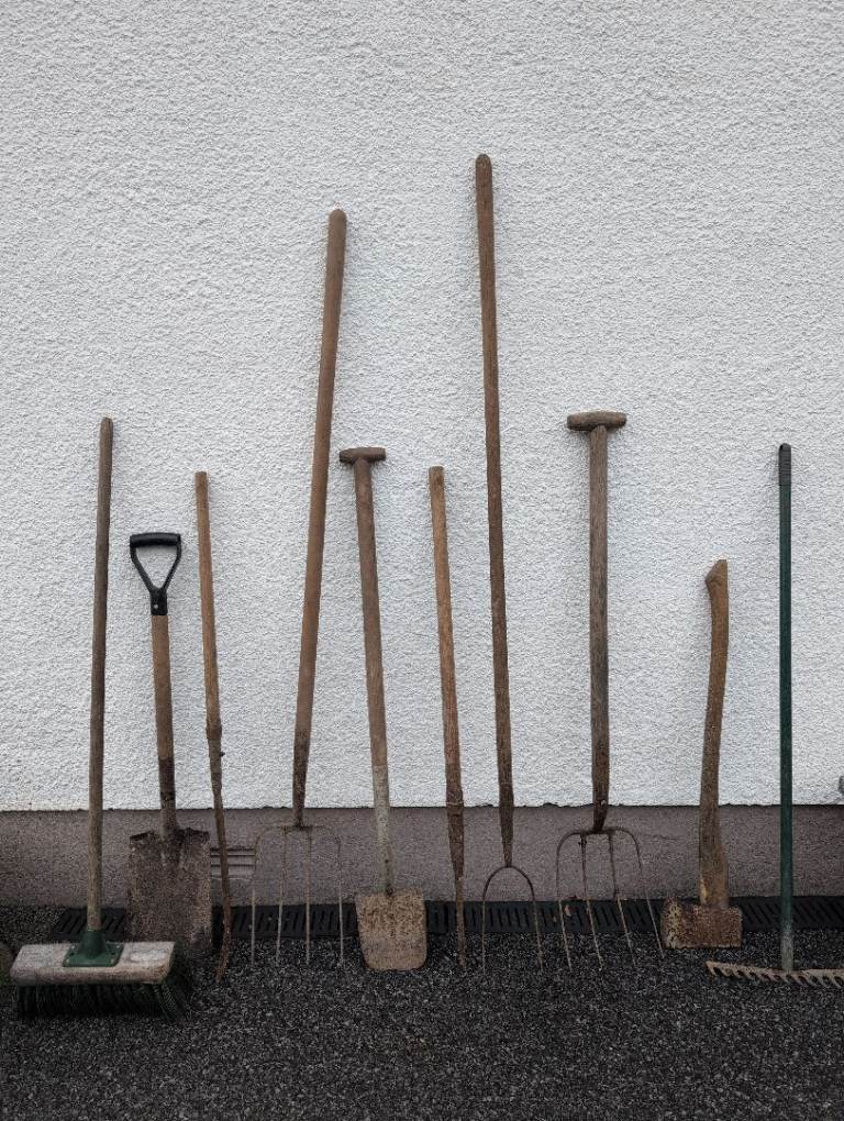 Selection of Garden Tools, shovel, spade, forks, brush, axe