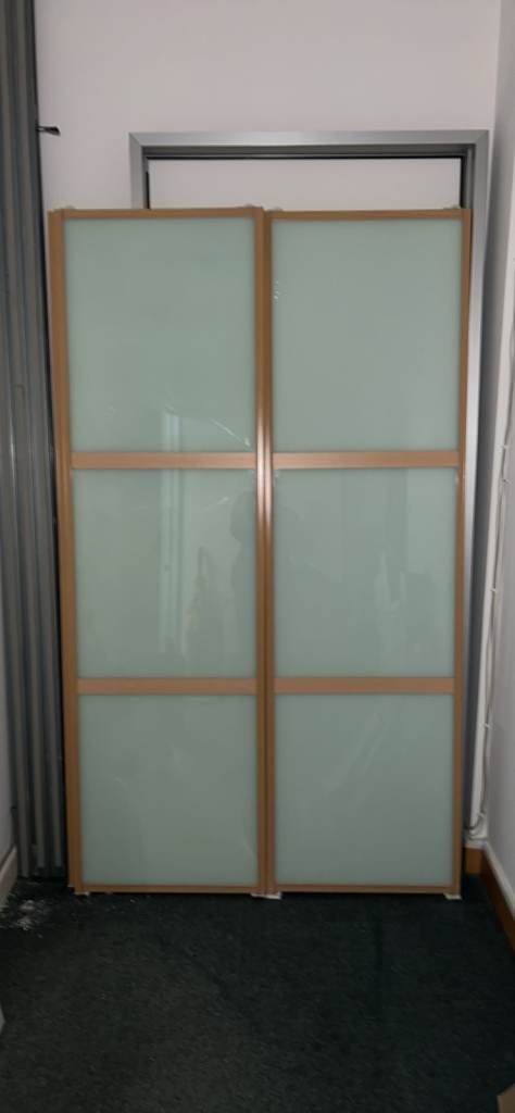 Frosted glass and wooden sliding doors