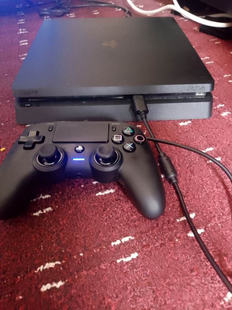 Sony PlayStation 4 Slim Console with Controller – Good Condition