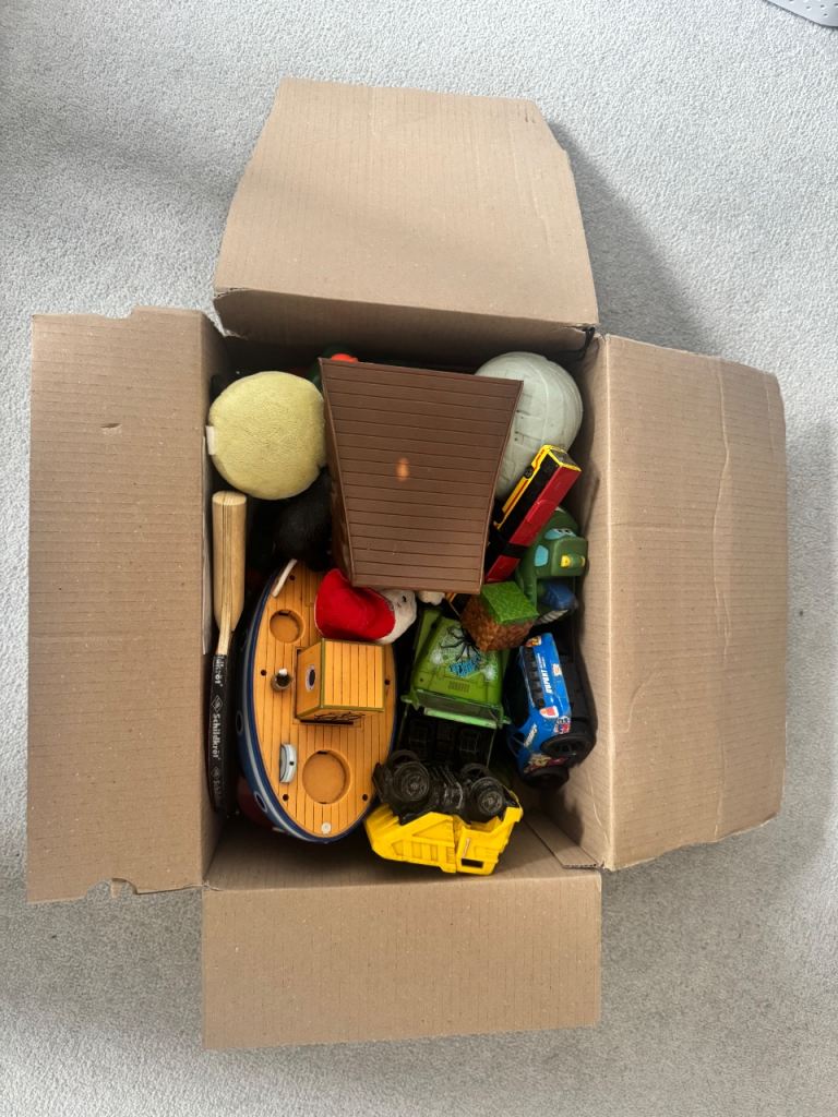 Small box of assorted toys