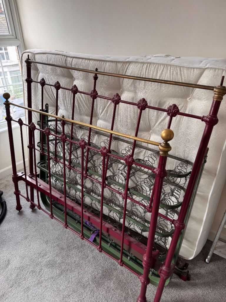 Old iron Victorian bed 