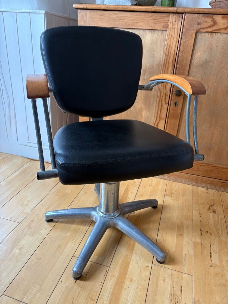 Vintage barbers chair- black seat- wooden armrests- adjustable 