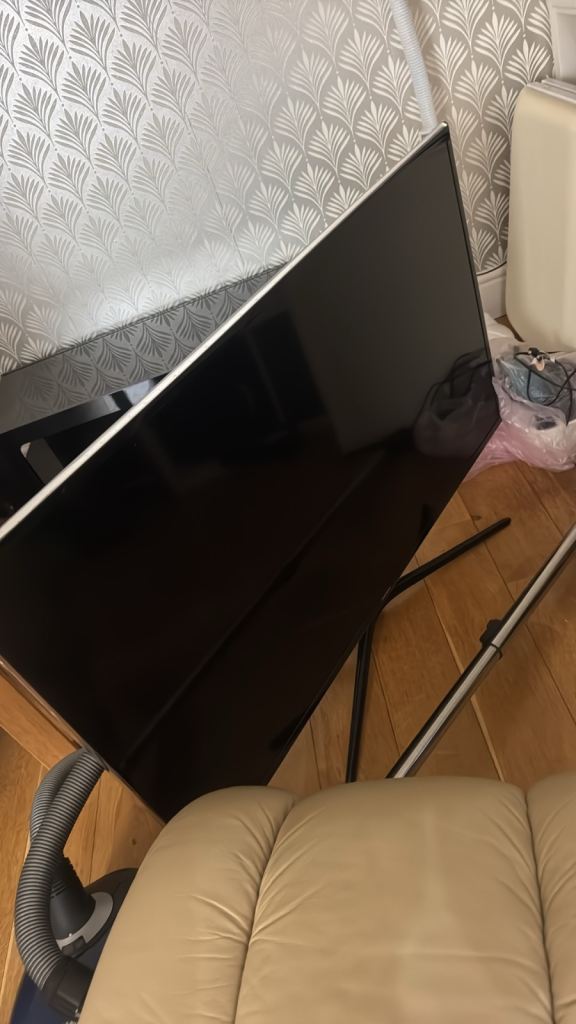 Flat Screen TV with Stand – Good Condition