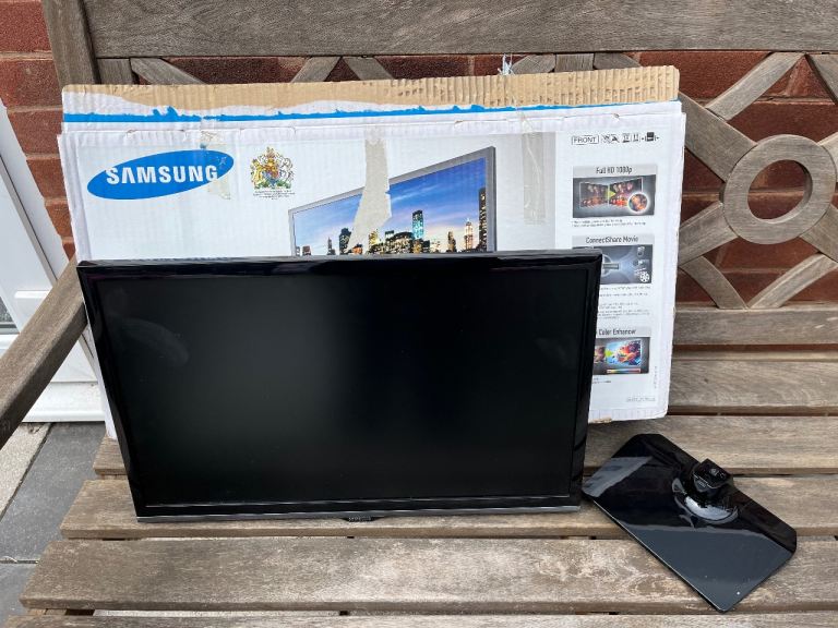 Boxed 22” Samsung LED TV with wall bracket