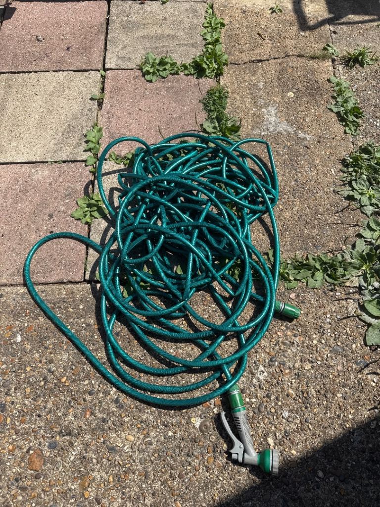 Garden Hose with Spray Nozzle – Green, Good Condition