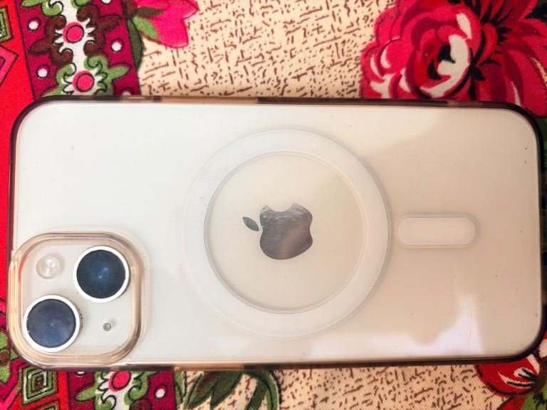 iPhone with Clear Case and MagSafe Ring – Good Condition