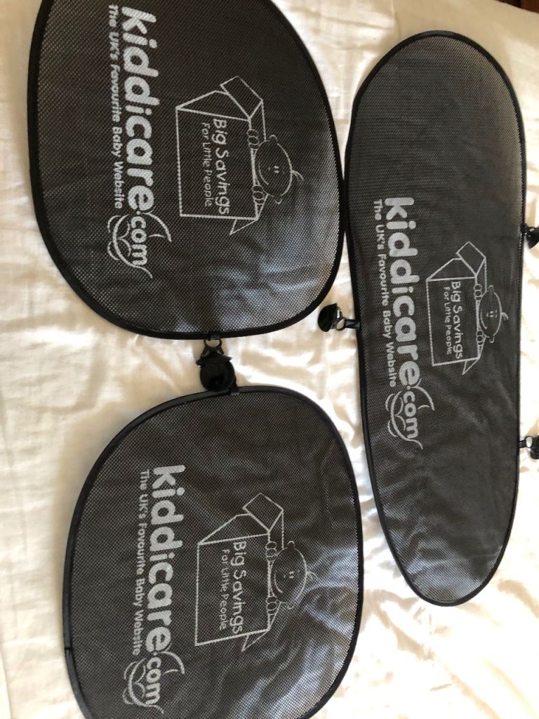 Set of three Kiddicare sun shades 