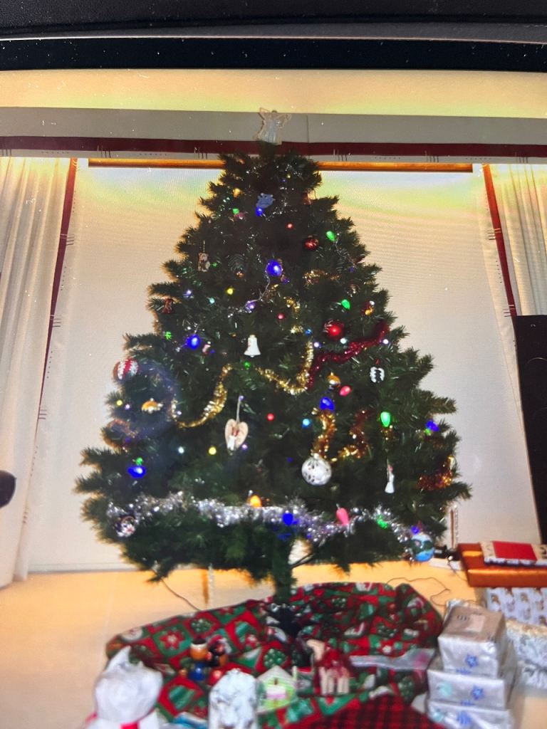 Free large green artificial Christmas tree. Free to uplift. 